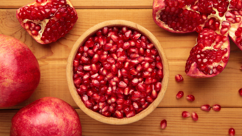 opened pomegranate with pomegranate seeds