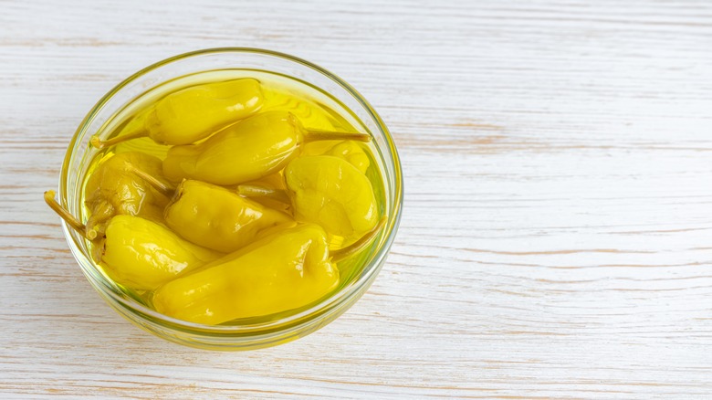 Jar of pepperoncini peppers.