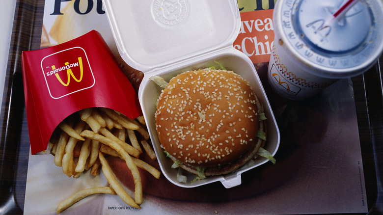 Burger, fries, and drink from McDonald's on a tray in 1990s.