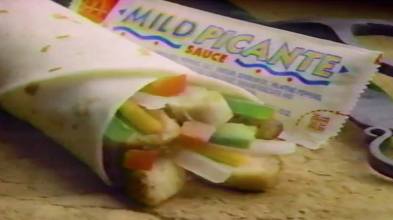 Screenshot of McDonald's chicken fajita commercial showing one fajita alongside a packet of Picante Sauce
