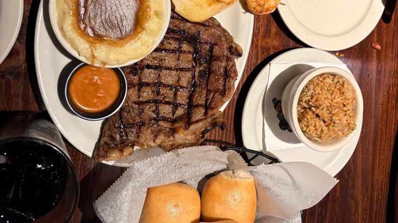 Steak, shrimp, rolls and sides at Texas Roadhouse