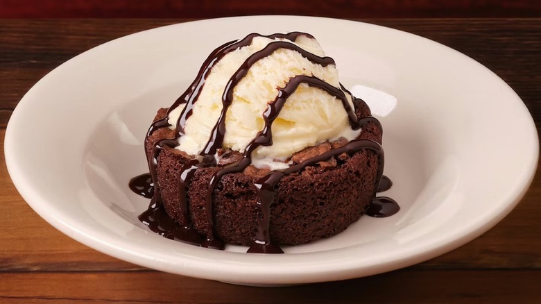 Texas Roadhouse brownie with ice cream and chocolate sauce