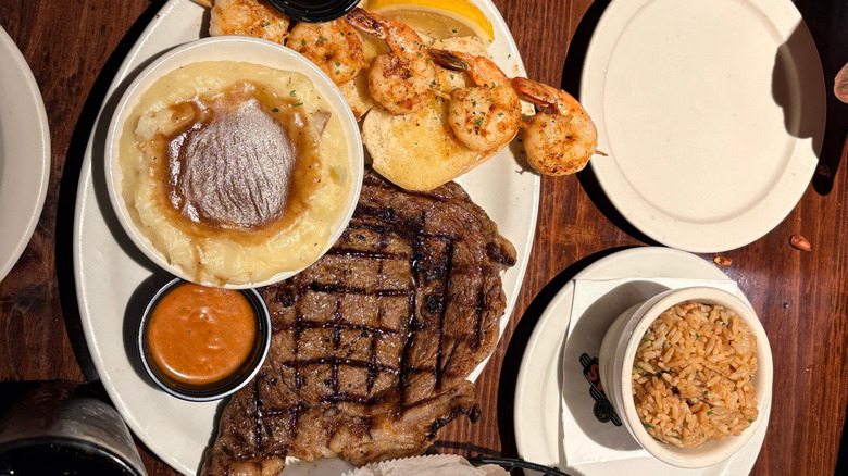 Steak, shrimp, and side dishes served at Texas Roadhouse