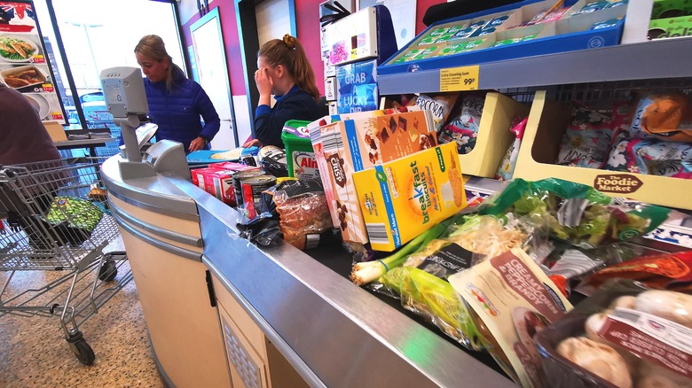 Groceries on the conveyor belt at an Aldi checkout station