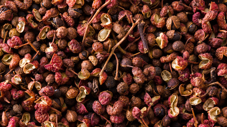A top-down view of a massive pile of Szechuan peppercorns