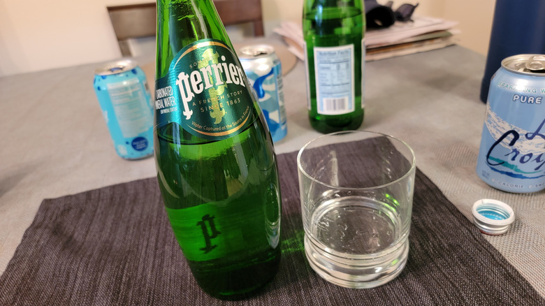 Green Perrier bottle