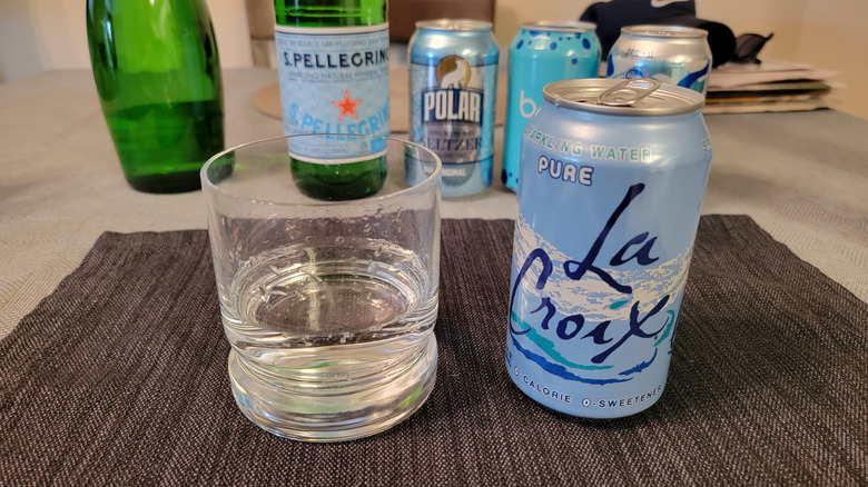 Can of natural LaCroix water next to glass