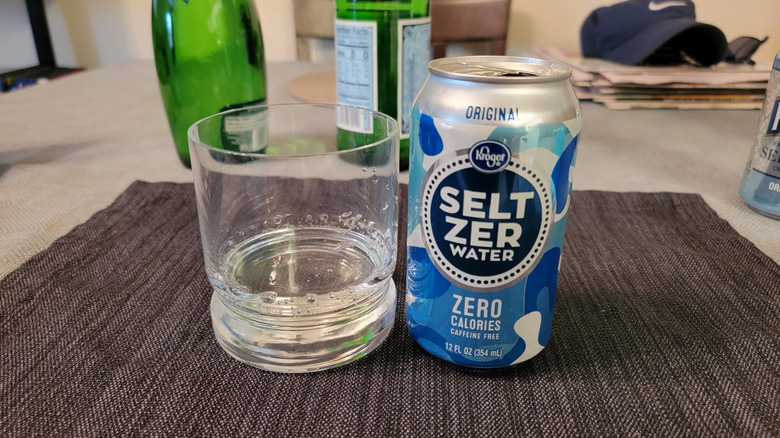 Can of Kroger Seltzer water next to glass