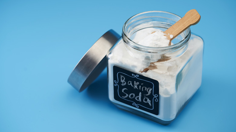 A clear jar of baking soda