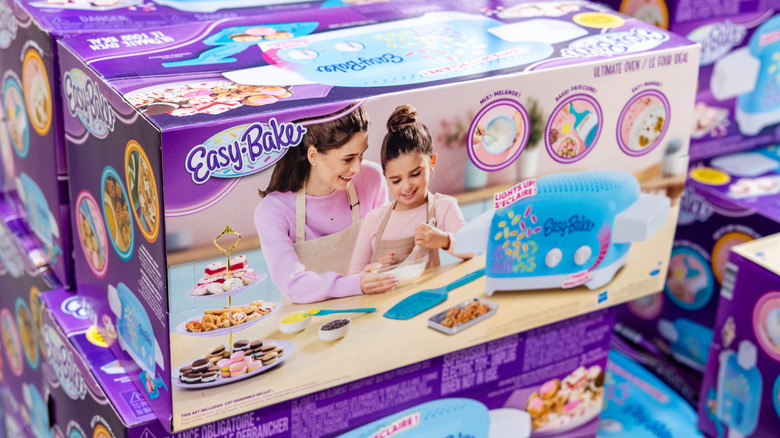 Boxes of easy bake oven stacked on one another