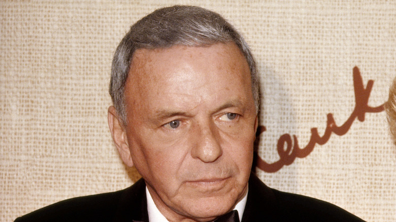 Close-up of a statue of Frank Sinatra tipping his hat