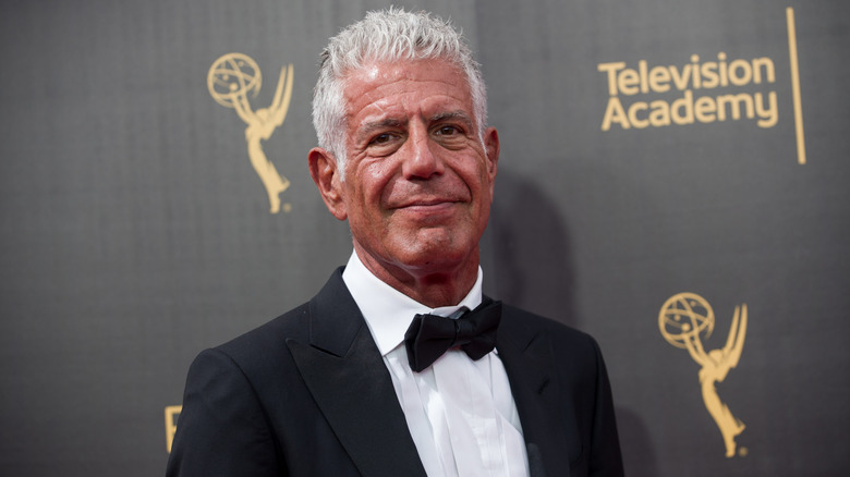 Anthony Bourdain smiling in at the Academy Awards