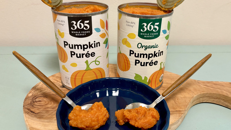 Cans of 365 by Whole Foods pumpkin puree