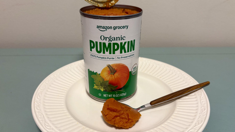 A can of Amazon Grocery organic pumpkin on a plate