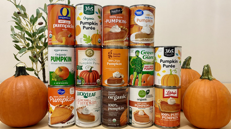 Stacks of canned pumpkin puree from different brands