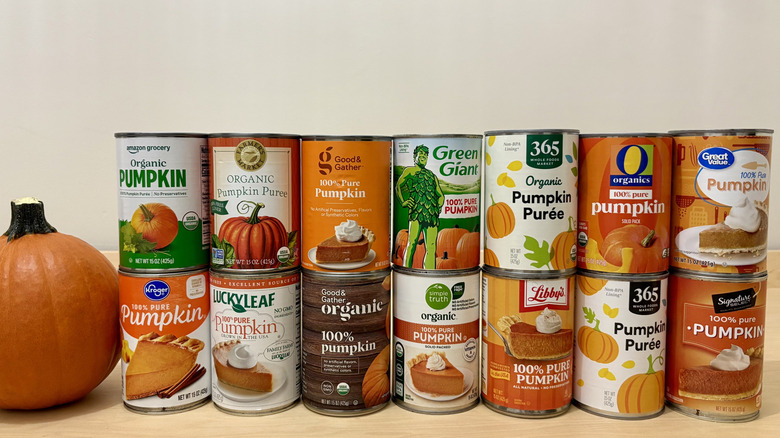 A stacked lineup of popular canned pumpkin brands