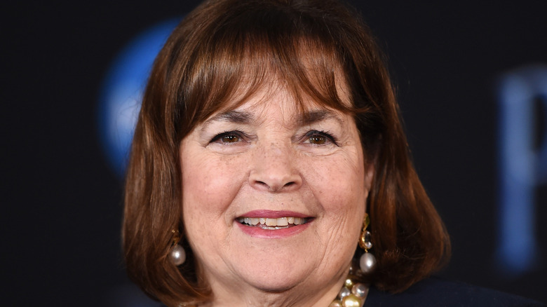 Candid close-up of Ina Garten smiling in front of black background