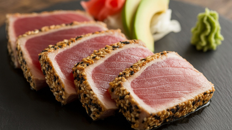 Sesame encrusted ahi tuna steaks on a plate