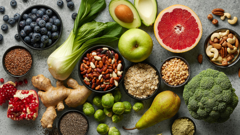 A selection of different fruits, nuts, and vegetables.