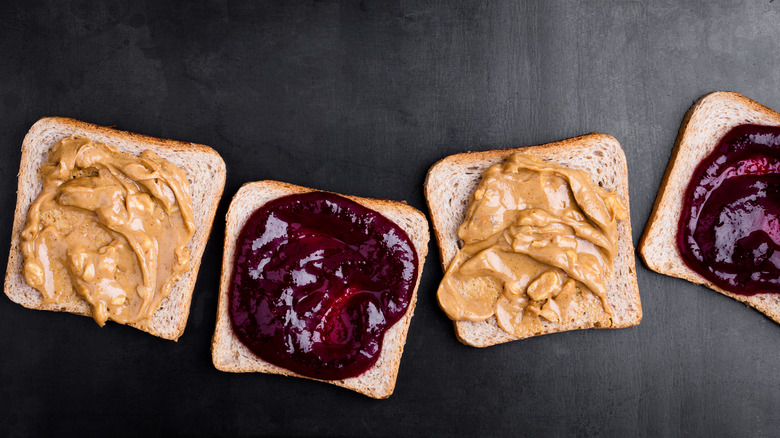 Top view of unassembled peanut butter and jelly sandwiches.