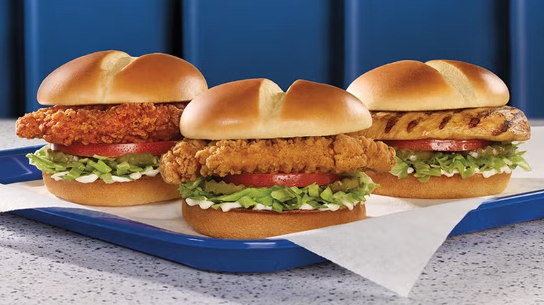 Three chicken sandwiches from Culver's on a blue tray