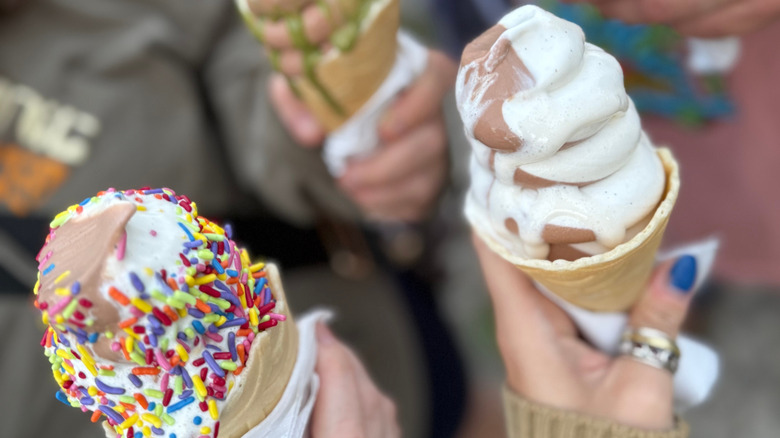 Hands holding ice crean cones