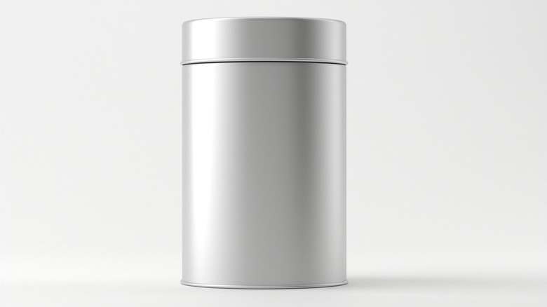 Aluminium storage container with lid on white background