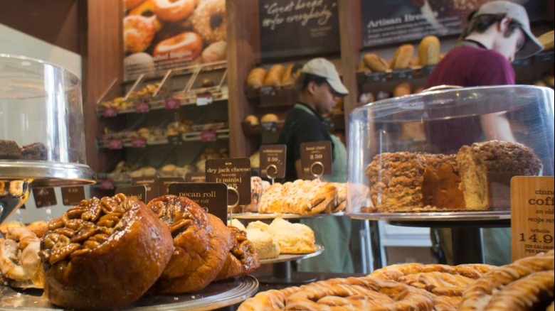 Two Panera employees working at the bakery.
