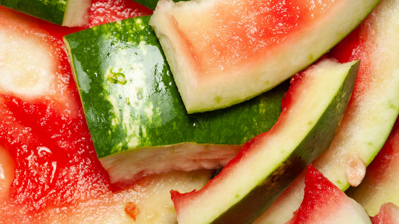 Close-up of eaten watermelon rinds jumbled together