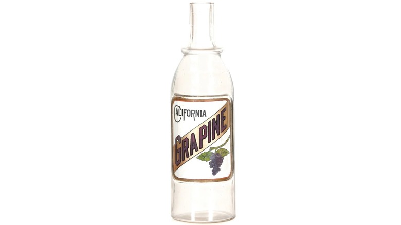 A glass bottle of California Grapine grape soda syrup