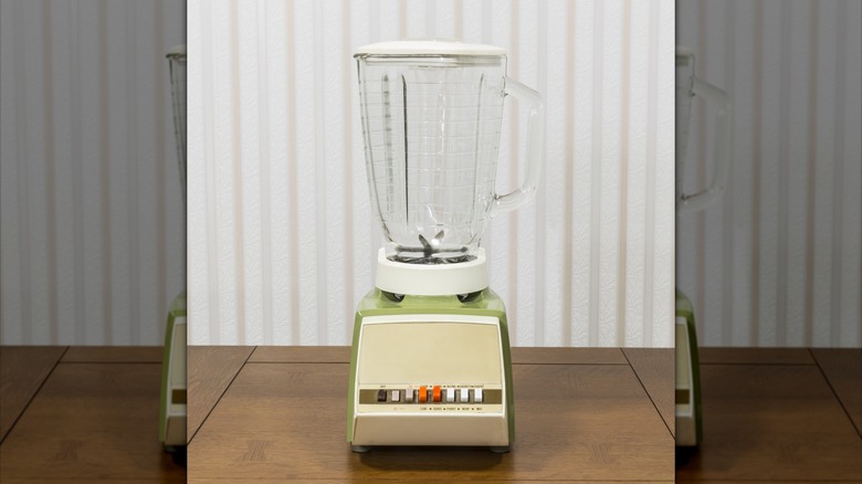 Vintage blender on a wood table