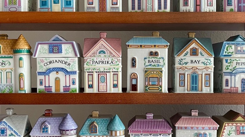 Lenox Spice Village jars on a wooden shelf