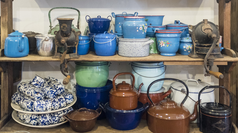 Shelves of vintage kitchenware containers