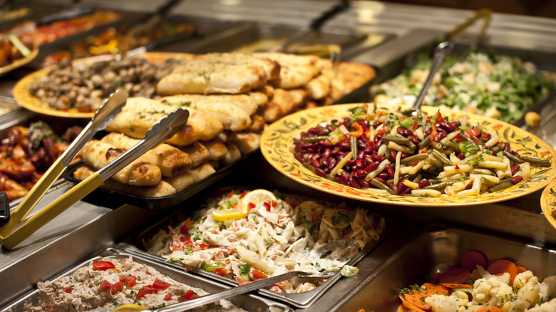 A large buffet with different foods