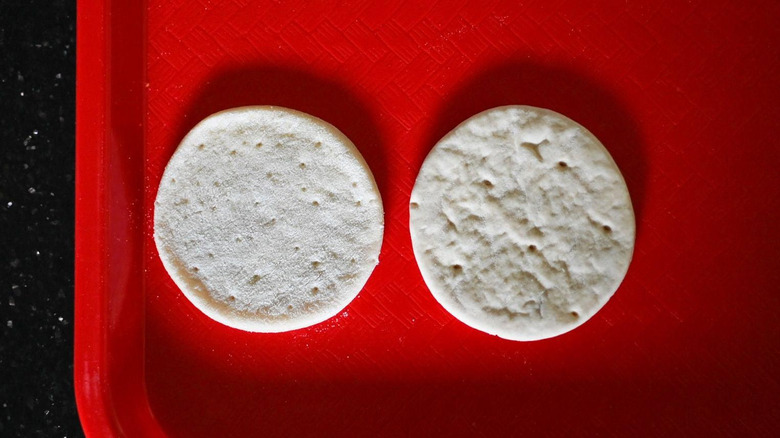 two plain pizza crusts