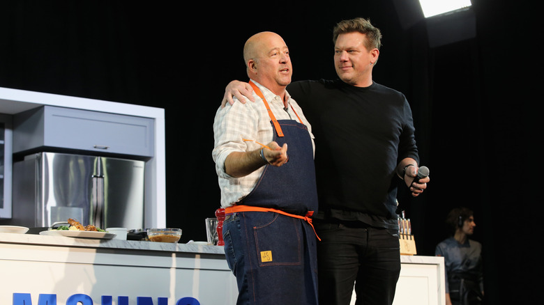 Andrew Zimmern and Tyler Florence on stage