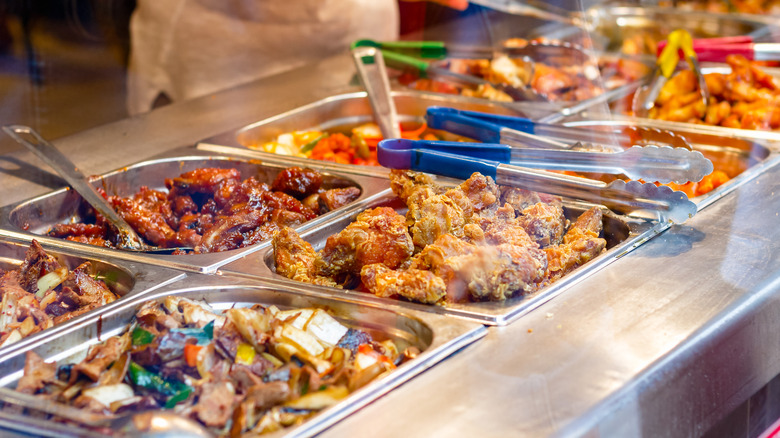 Different dishes laid out in a buffet restaurant