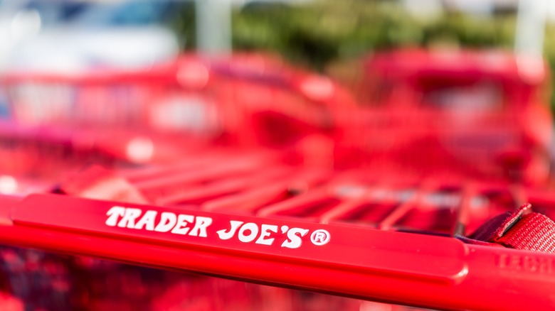 Red shopping carts with Trader Joe's store sign on handle
