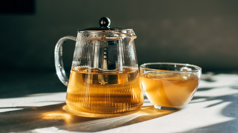Tea in a clear pot and cup