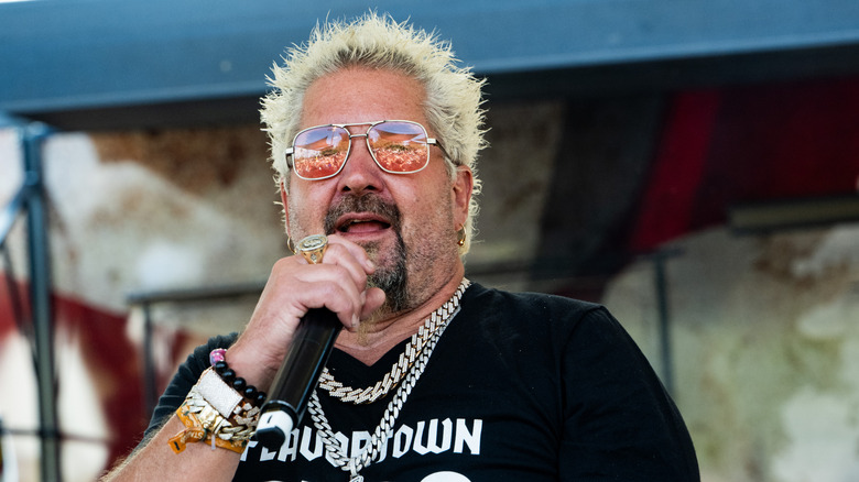 Guy Fieri with a microphone