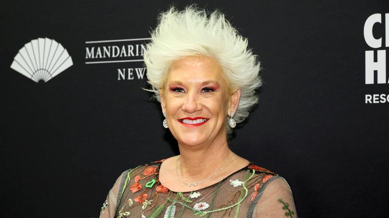 Anne Burrell, smiling, at an event