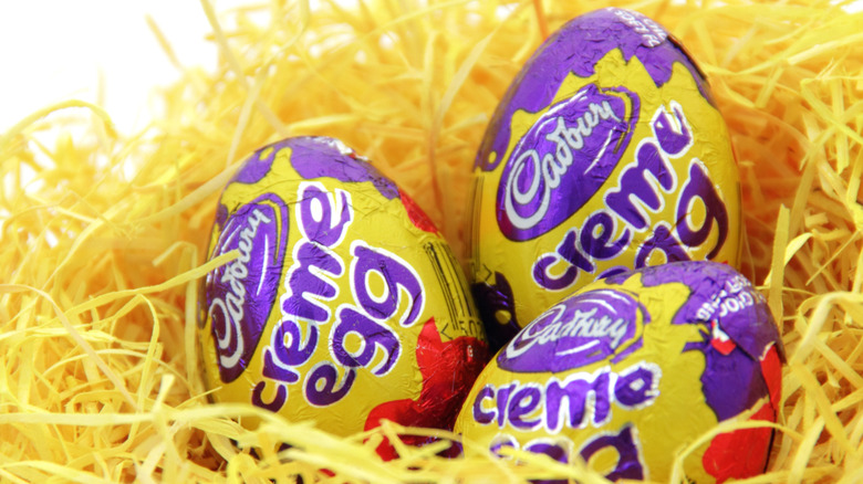 Cadbury Creme Eggs in a fake yellow nest