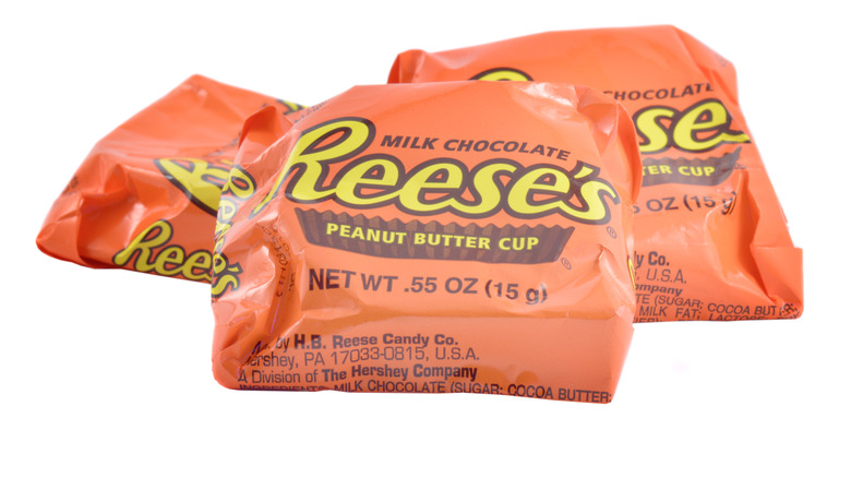 Three Reese's Peanut Butter Cups on a white background