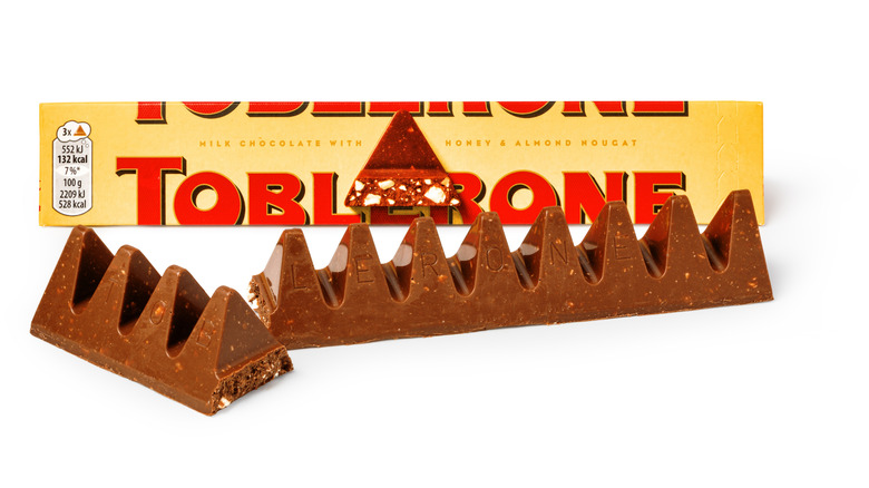 Toblerone packaging behind the chocolate bar