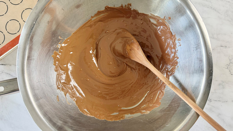 melted chocolate in a metal bowl