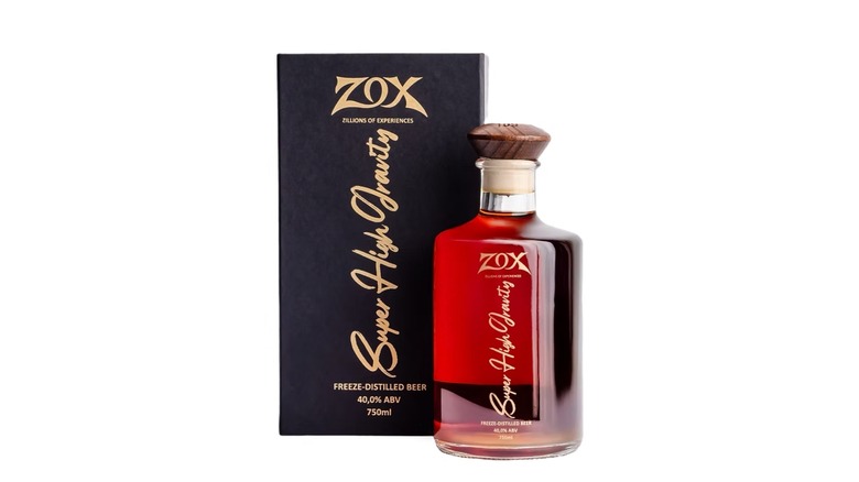 Bottle of Zox Super High Gravity beer next to black label box on white background