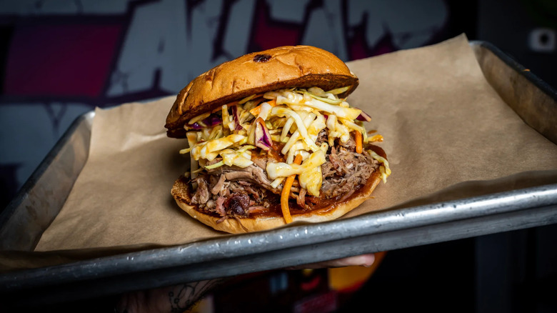 A brisket sandwich with coleslaw from Stack City in Austin