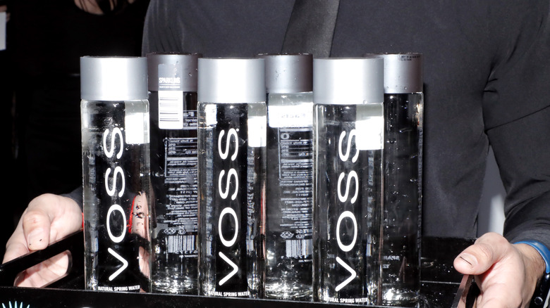 Voss water bottles on tray
