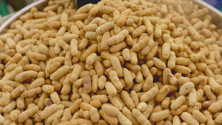 large number of peanuts in shells