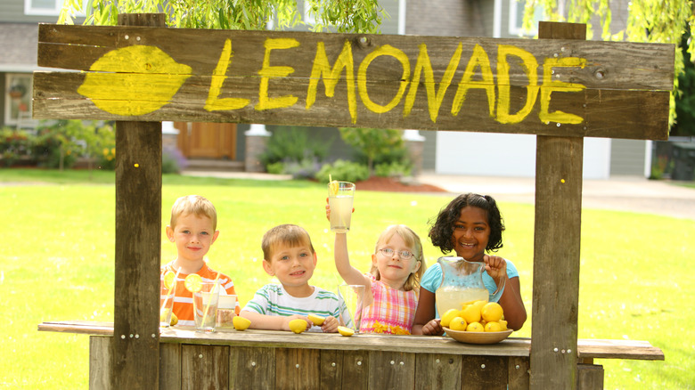 Four children at a lemonade stand
